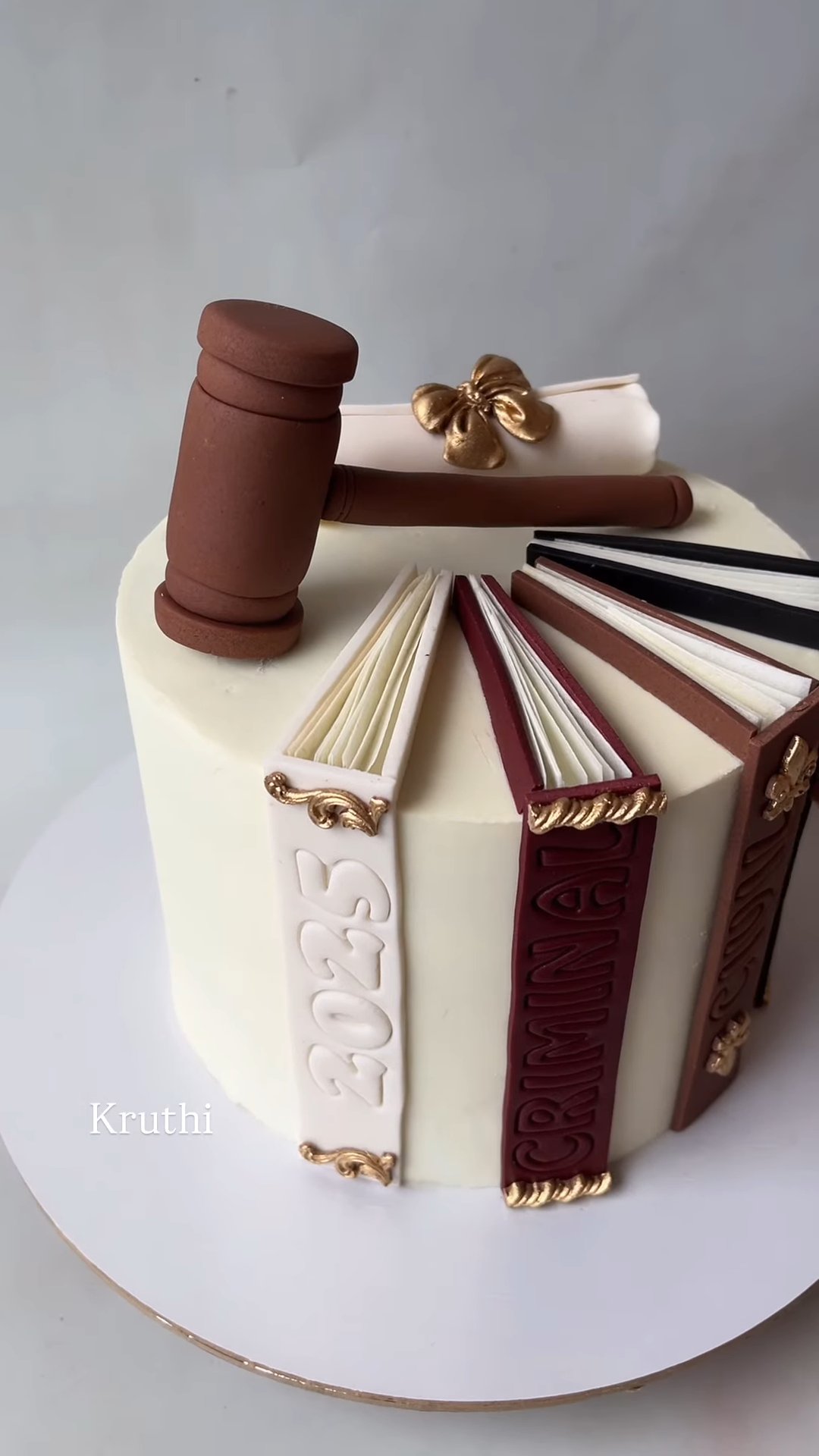 Advocate theme cake with gavel and law books