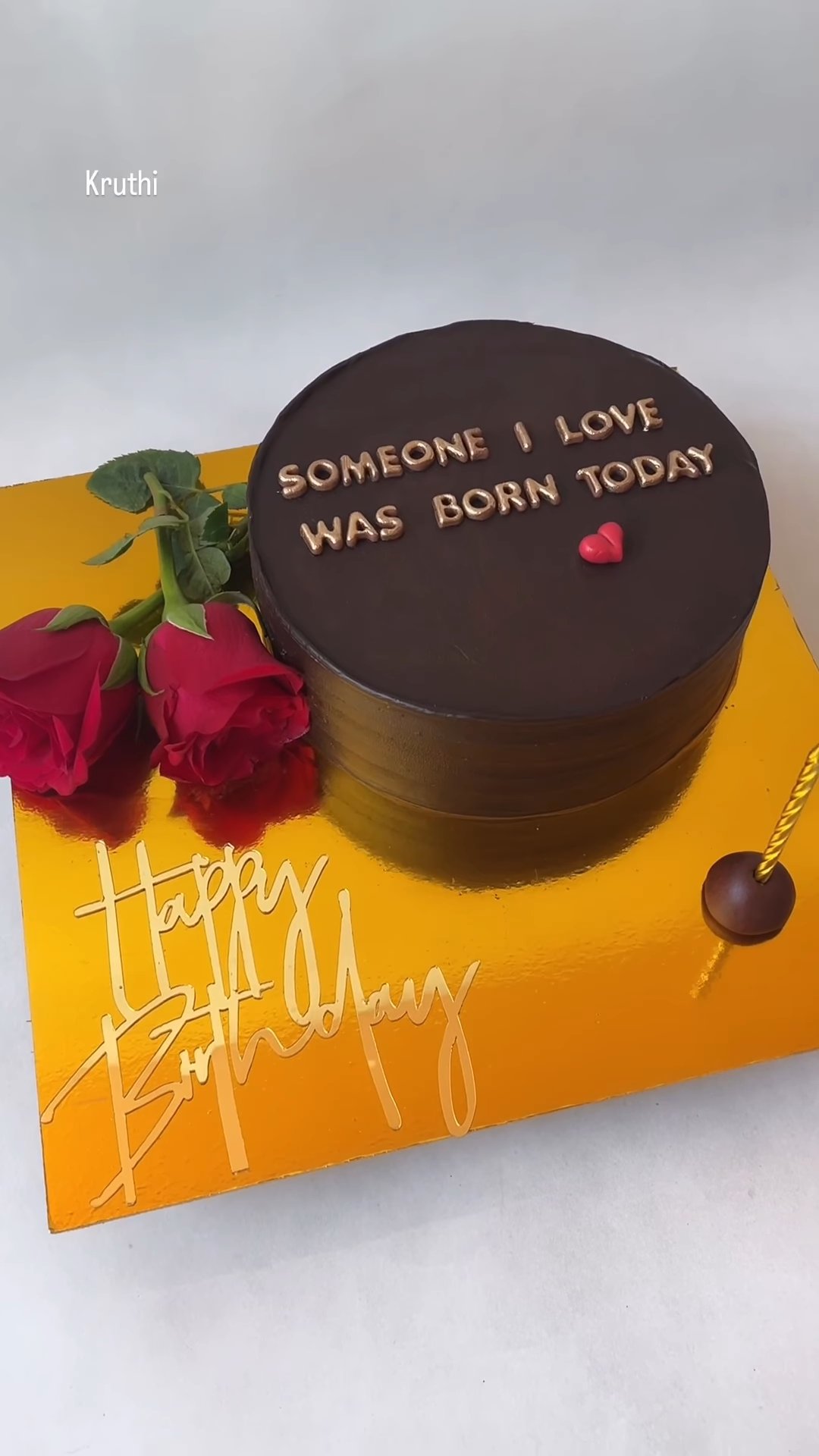 Chocolate celebration cake with fresh roses